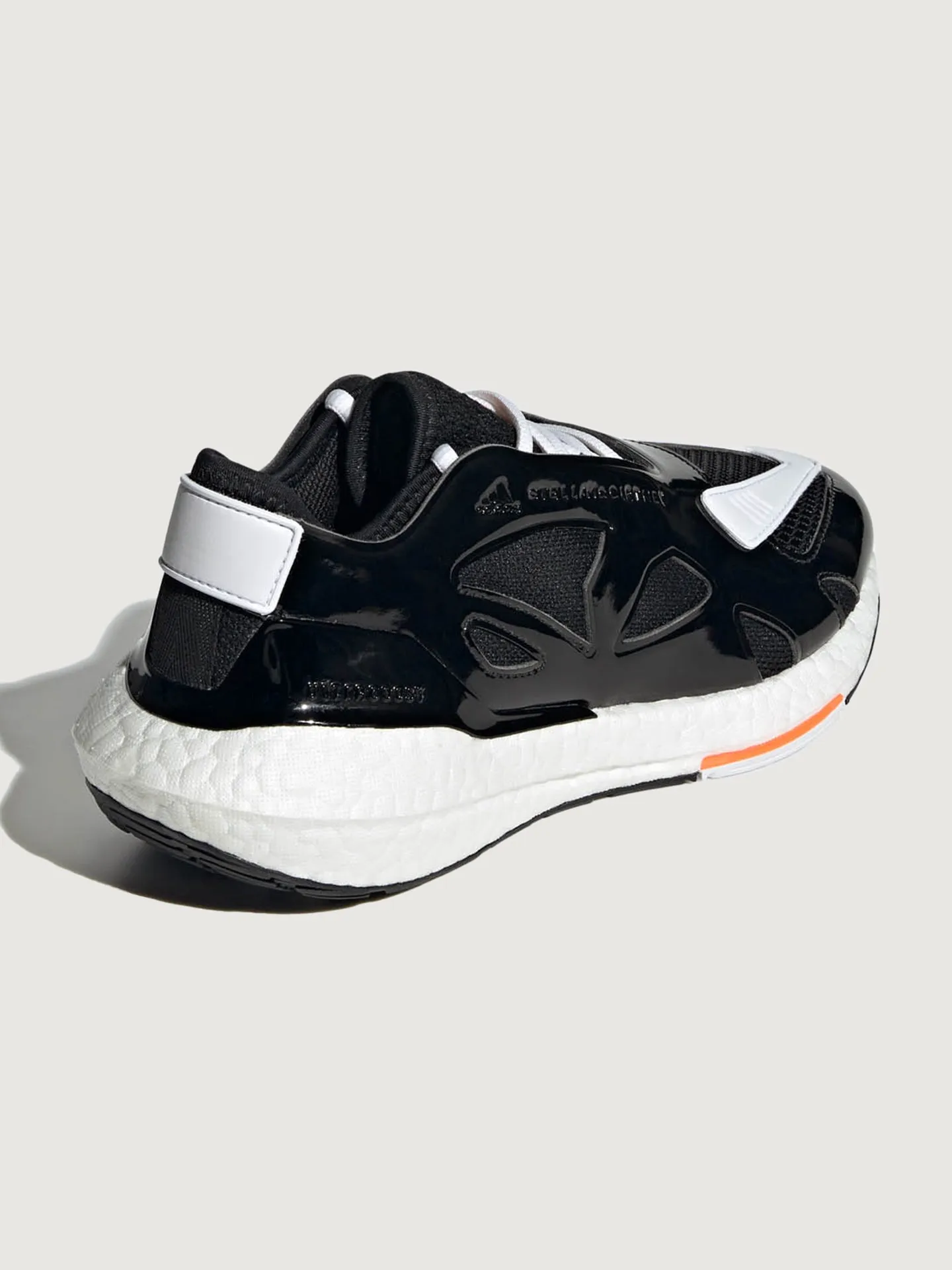 adidas by Stella McCartney ULTRABOOST 22 - CORE BLACK/FTWR WHITE/SIGNAL ORANGE